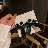 Lizakosht The new Korean premium black bow drop earrings fashion jewelry popular dark gift statement earrings for women.
