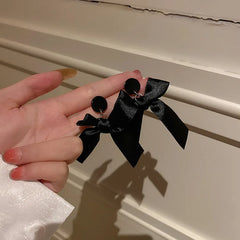 Lizakosht The new Korean premium black bow drop earrings fashion jewelry popular dark gift statement earrings for women.