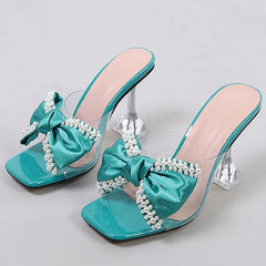 LIZAKOSHT  -  Fashion Pearl Bow Designer Women Slipper 2025 New Transparent PVC High Heeled Women Sandals Sexy Non Slip Mule Shoes Women Pumps