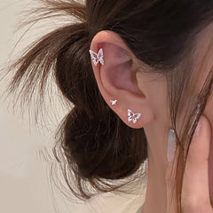 Lizakosht Needle Hollow Mini Butterfly Stud Earrings for Women Girls Silver Color Rhinestone Pierced Earrings Fashion Jewelry