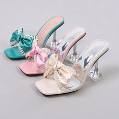 LIZAKOSHT  -  Fashion Pearl Bow Designer Women Slipper 2025 New Transparent PVC High Heeled Women Sandals Sexy Non Slip Mule Shoes Women Pumps