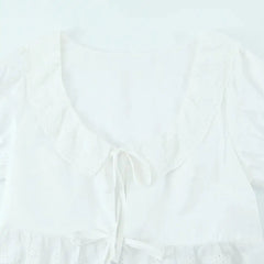 LIZAKOSHT - Sexy White Embroidery Hollow Out Hole Wood ears O neck Short Puff Sleeve Shirt Women Ruffles Hem Front Bow Lacing Up Crop Tops