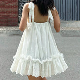LIZAKOSHT - Bohemian White Embroidery Flower Tide Bow Spaghetti Strap Dress Woman Wood ears Ruffles Hem Swing Loose Swing Mini Dresses Robe