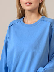 LIZAKOSHT  -  Exposed Seam Round Neck Long Sleeve Sweatshirt