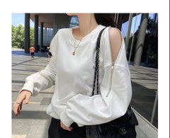 Spring and autumn design sense long-sleeved off-shoulder sweater women's tide 2021 new pullover jacket