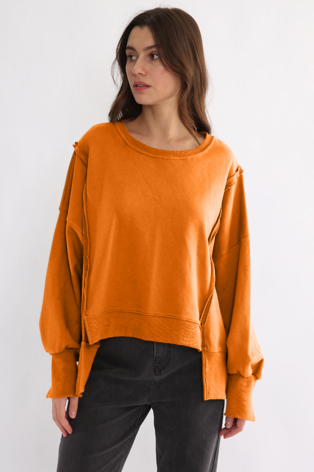 LIZAKOSHT  -  Exposed Seam High-Low Long Sleeve Sweatshirt