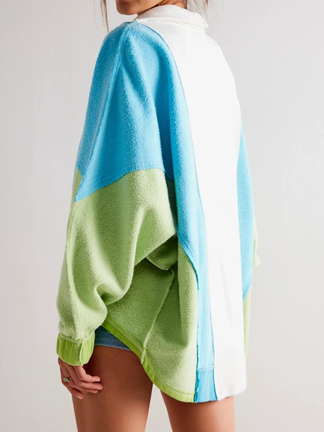 LIZAKOSHT  -  High-Low Exposed Seam Contrast Long Sleeve Sweatshirt