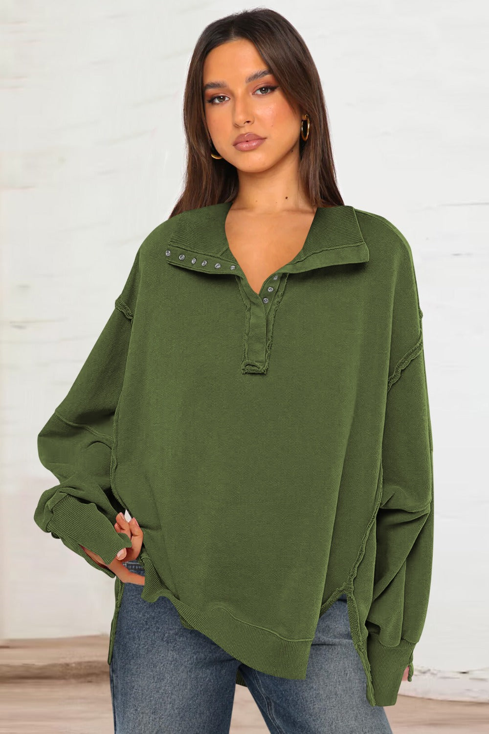 LIZAKOSHT  -  Exposed Seam Side Slit Long Sleeve Sweatshirt