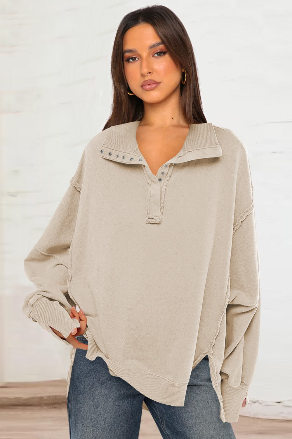 LIZAKOSHT  -  Exposed Seam Side Slit Long Sleeve Sweatshirt