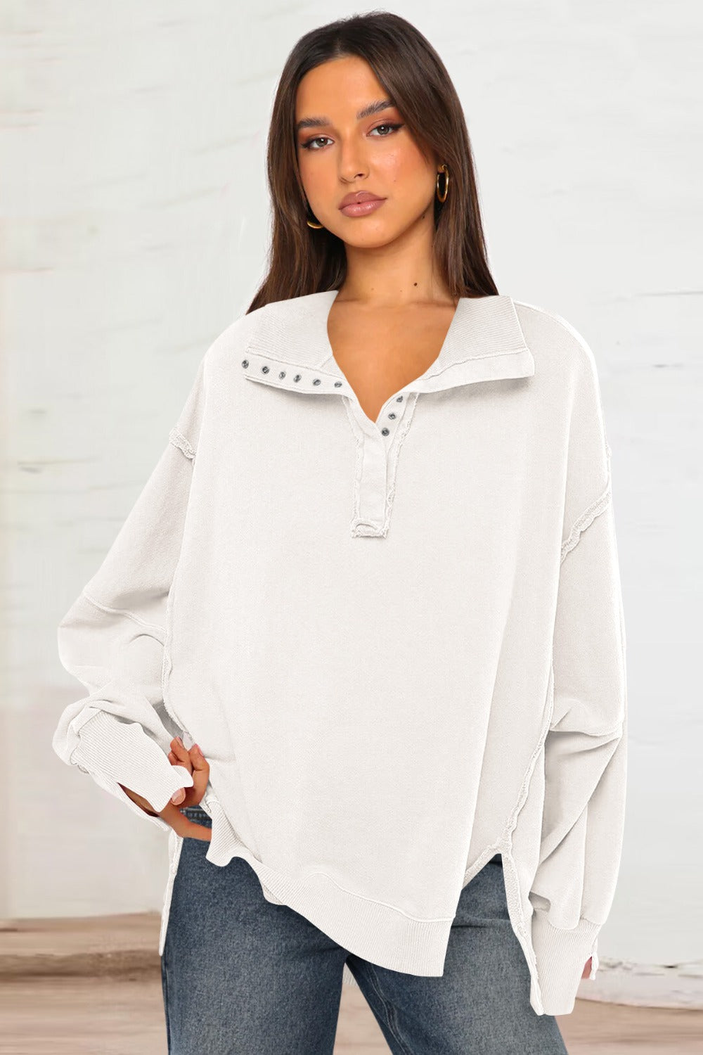LIZAKOSHT  -  Exposed Seam Side Slit Long Sleeve Sweatshirt