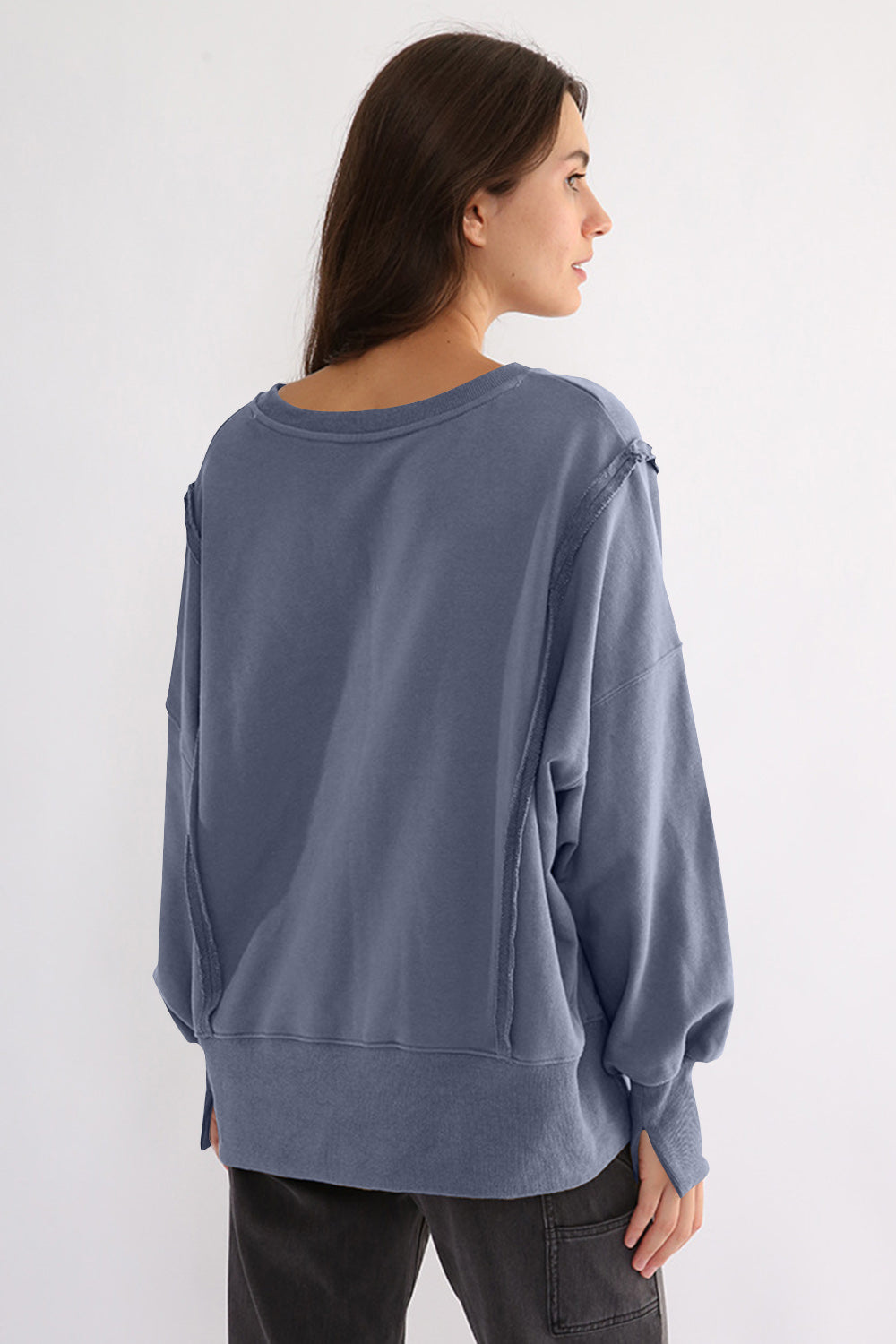 LIZAKOSHT  -  Exposed Seam High-Low Long Sleeve Sweatshirt