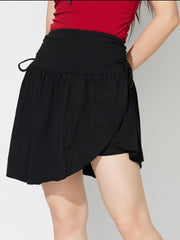 LIZAKOSHT  -  Side Tie Asymmetric Hem Mini Skirt