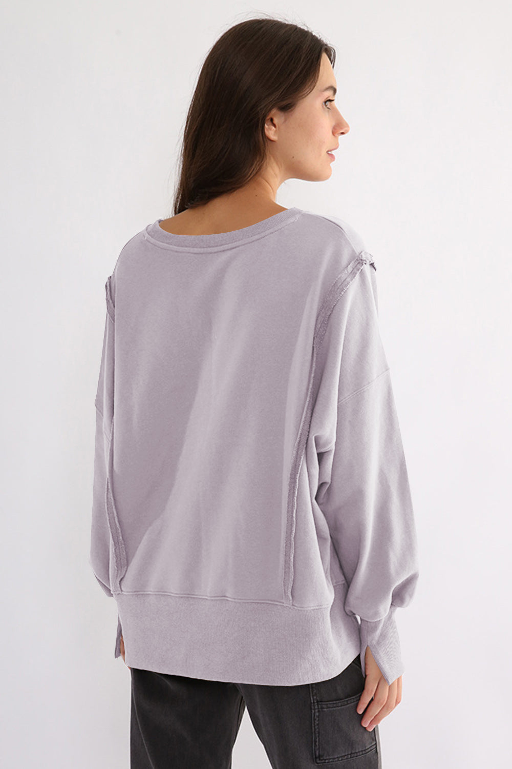 LIZAKOSHT  -  Exposed Seam High-Low Long Sleeve Sweatshirt