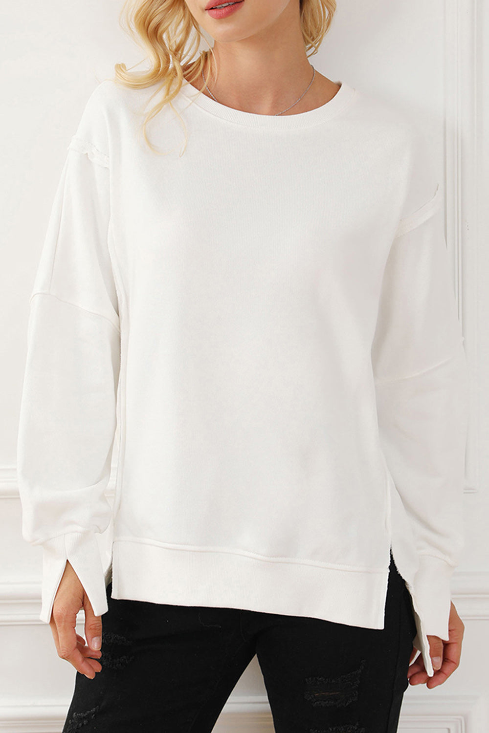 LIZAKOSHT  -  Exposed Seam High-Low Long Sleeve Sweatshirt