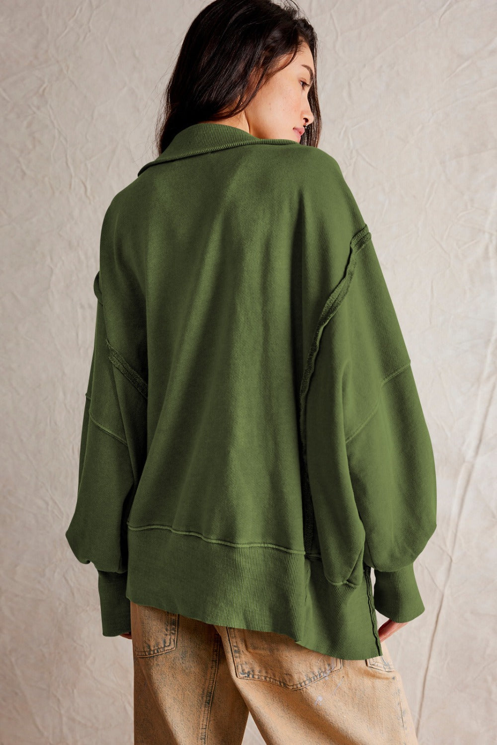LIZAKOSHT  -  Exposed Seam Side Slit Long Sleeve Sweatshirt