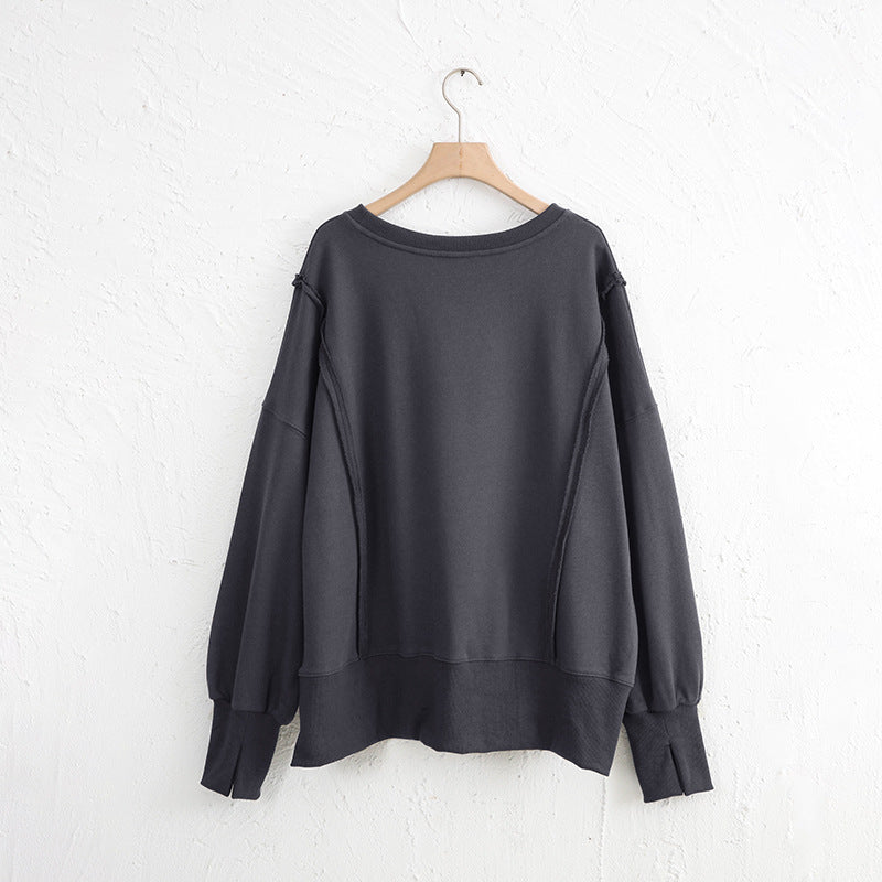 LIZAKOSHT  -  Exposed Seam High-Low Long Sleeve Sweatshirt