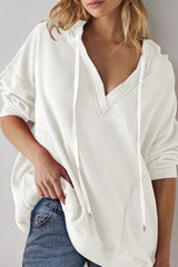 LIZAKOSHT  -  Exposed Seam Drawstring Long Sleeve Hoodie
