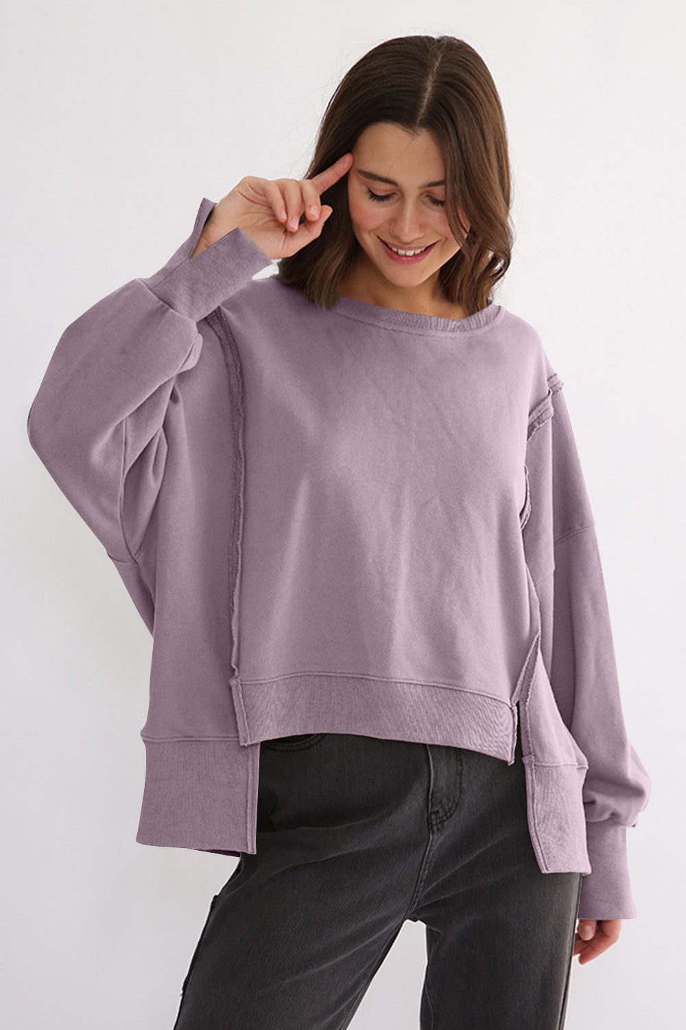 LIZAKOSHT  -  Exposed Seam High-Low Long Sleeve Sweatshirt