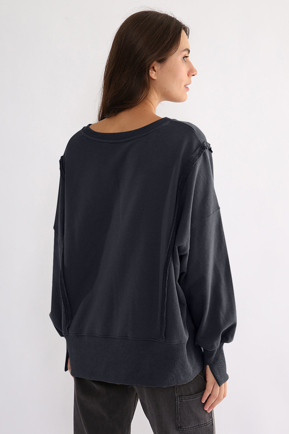 LIZAKOSHT  -  Exposed Seam High-Low Long Sleeve Sweatshirt
