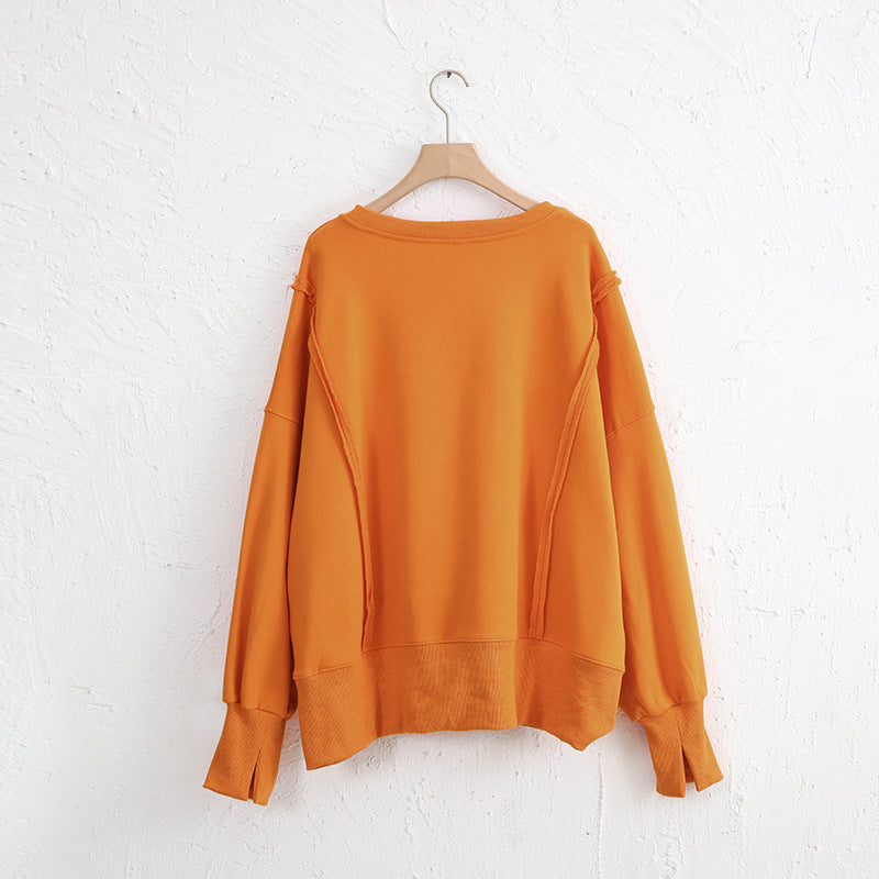 LIZAKOSHT  -  Exposed Seam High-Low Long Sleeve Sweatshirt
