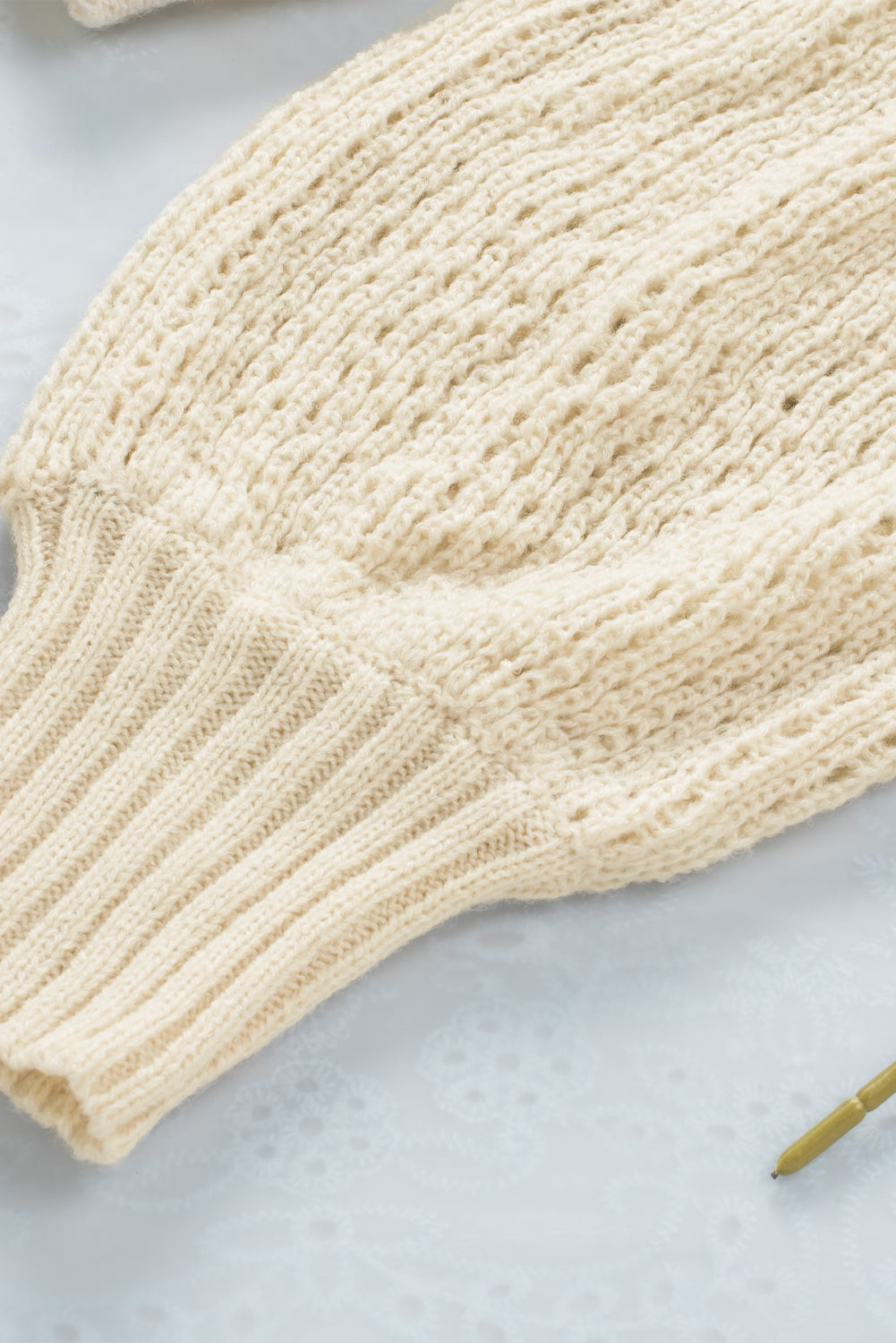 LIZAKOSHT  -  Openwork Boat Neck Raglan Sleeve Knit Top