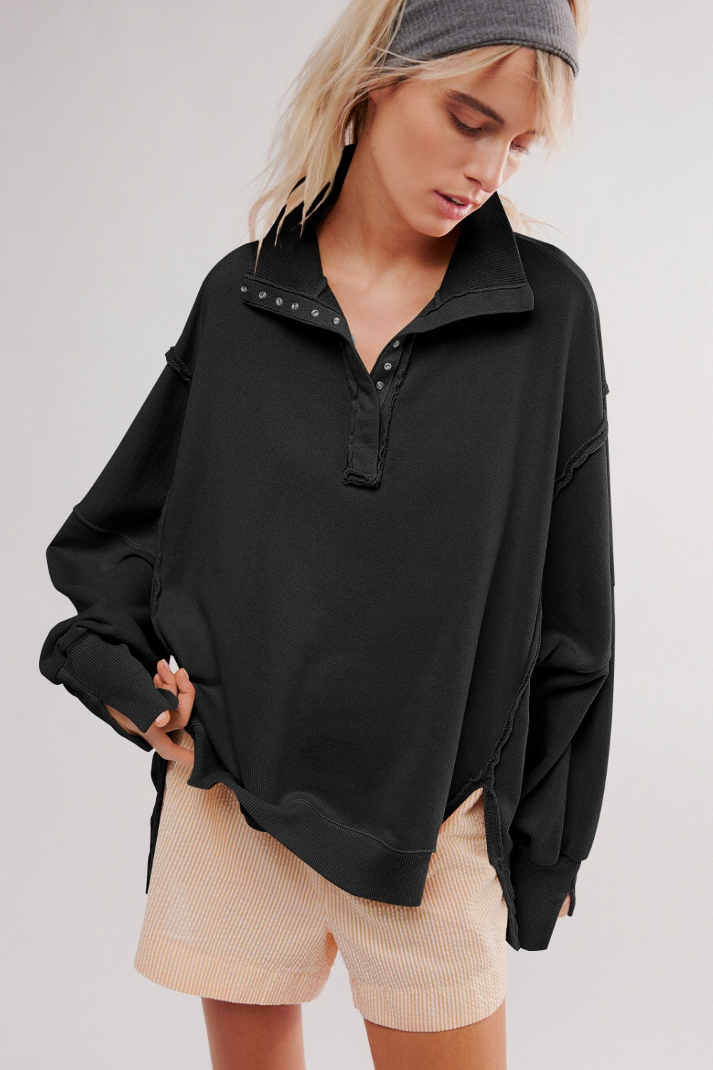 LIZAKOSHT  -  Exposed Seam Side Slit Long Sleeve Sweatshirt