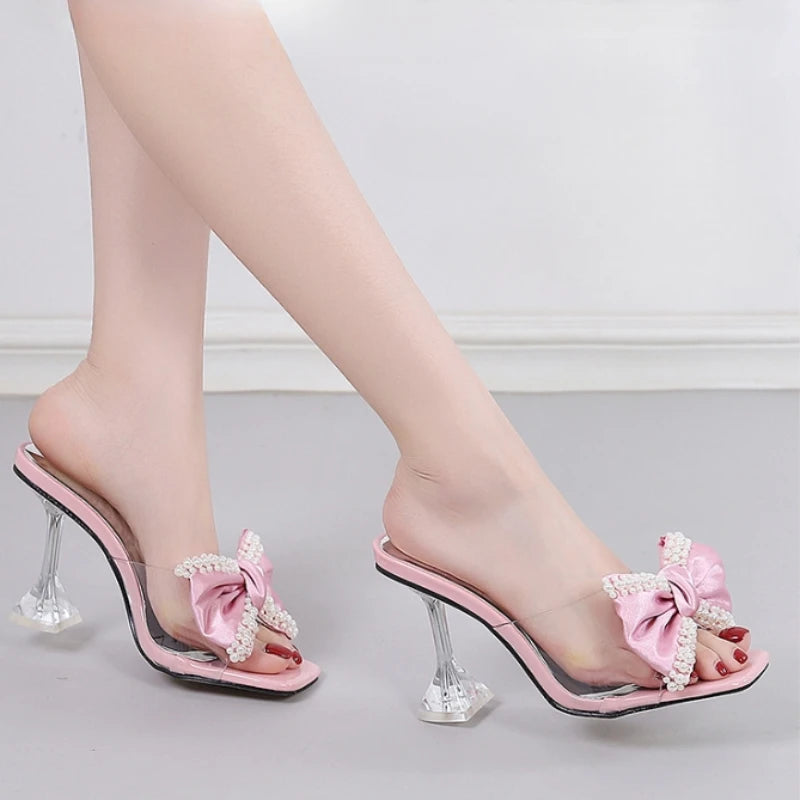 LIZAKOSHT  -  Fashion Pearl Bow Designer Women Slipper 2025 New Transparent PVC High Heeled Women Sandals Sexy Non Slip Mule Shoes Women Pumps