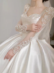 LIZAKOSHT  -  Satin Luxury Wedding Dresses Illusion O Neck Applique Sequined Beads Full Sleeve A Line Robe De Mariée Vestido Bow Bridal Gowns