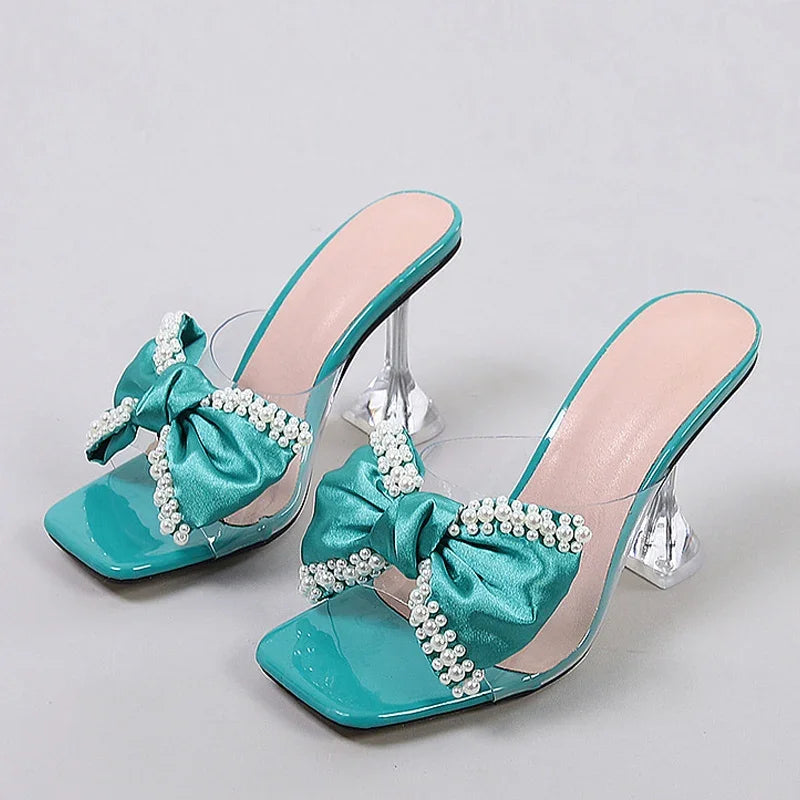 LIZAKOSHT  -  Fashion Pearl Bow Designer Women Slipper 2025 New Transparent PVC High Heeled Women Sandals Sexy Non Slip Mule Shoes Women Pumps