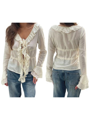 LIZAKOSHT  -  Elegant Women s V-Neck Peplum Blouse with Flowy Front Bow Tie Long Sleeve and Ruffle Trim Detail for a Stylish Look