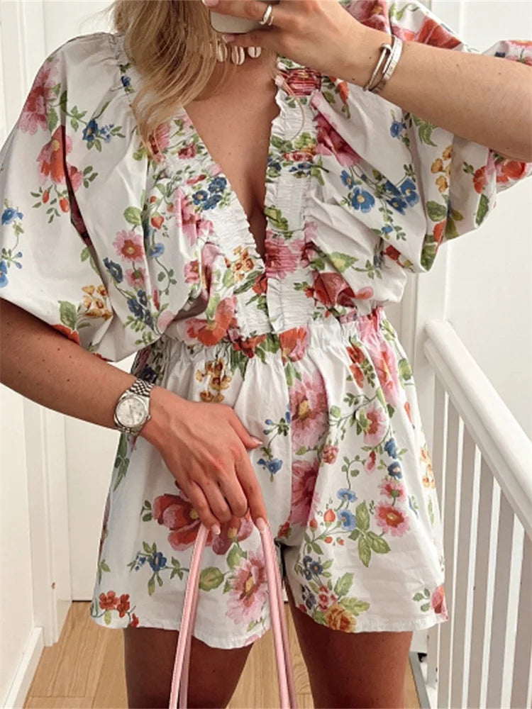 LIZAKOSHT  -  Women Deep V-Neck Loose Rompers Floral Print Short Puff Sleeve Summer Jumpsuits High Waist Playsuits Streetwear