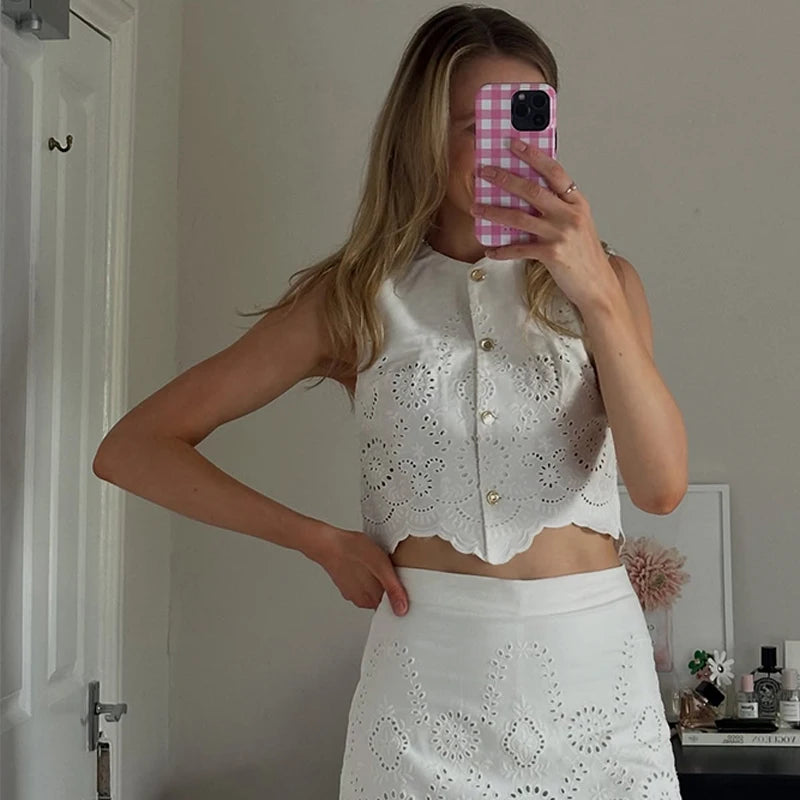LIZAKOSHT  -  Fashion Hollow Out Vest Skirt Women Set Sleeveless O-neck Single Breasted Top Min Empire Skirts 2025 Summer Chic Lady Outfit