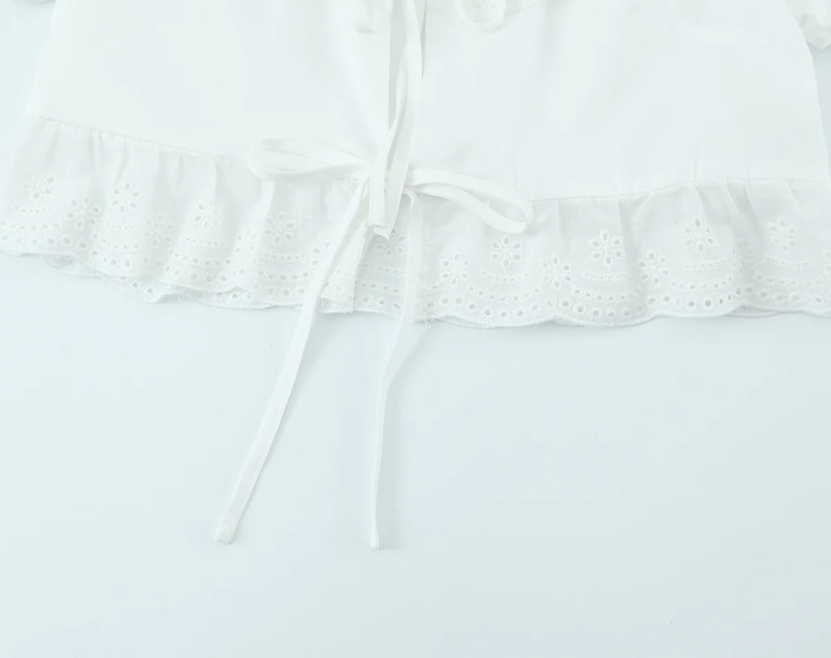 LIZAKOSHT  -  Sexy White Embroidery Hollow Out Hole Wood ears O neck Short Puff Sleeve Shirt Women Ruffles Hem Front Bow Lacing Up Crop Tops