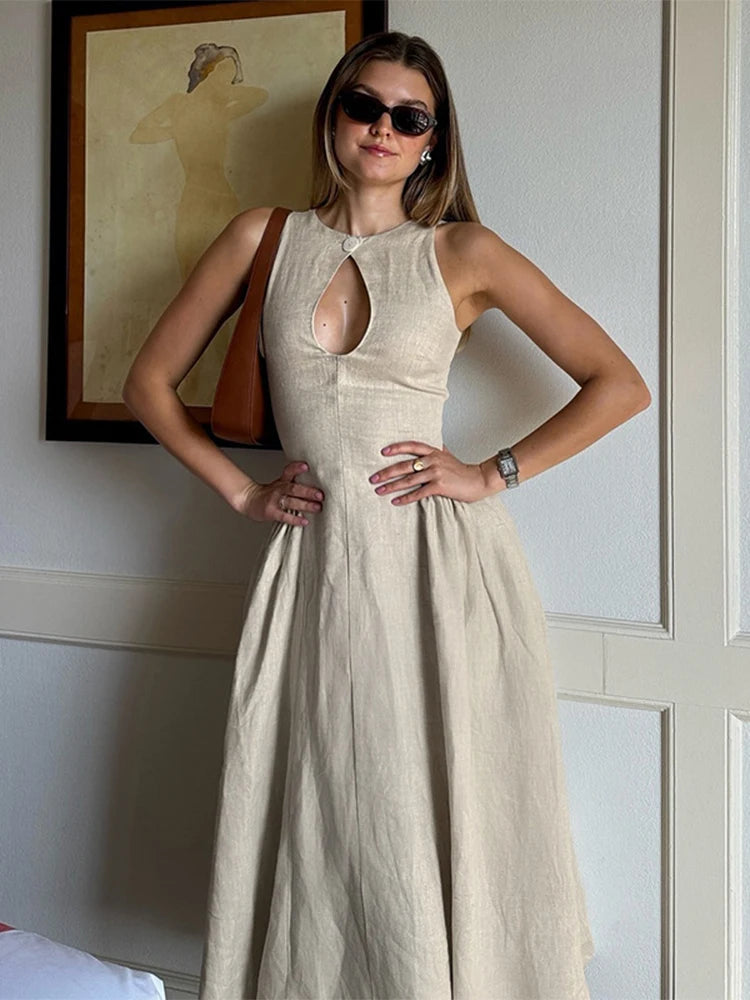 LIZAKOSHT  -  Elegant Solid Hollow Out Women Midi Dress Fashion Slim O-neck Sleeveless A-line Dresses 2024 Summer Office Lady Commuting Robes