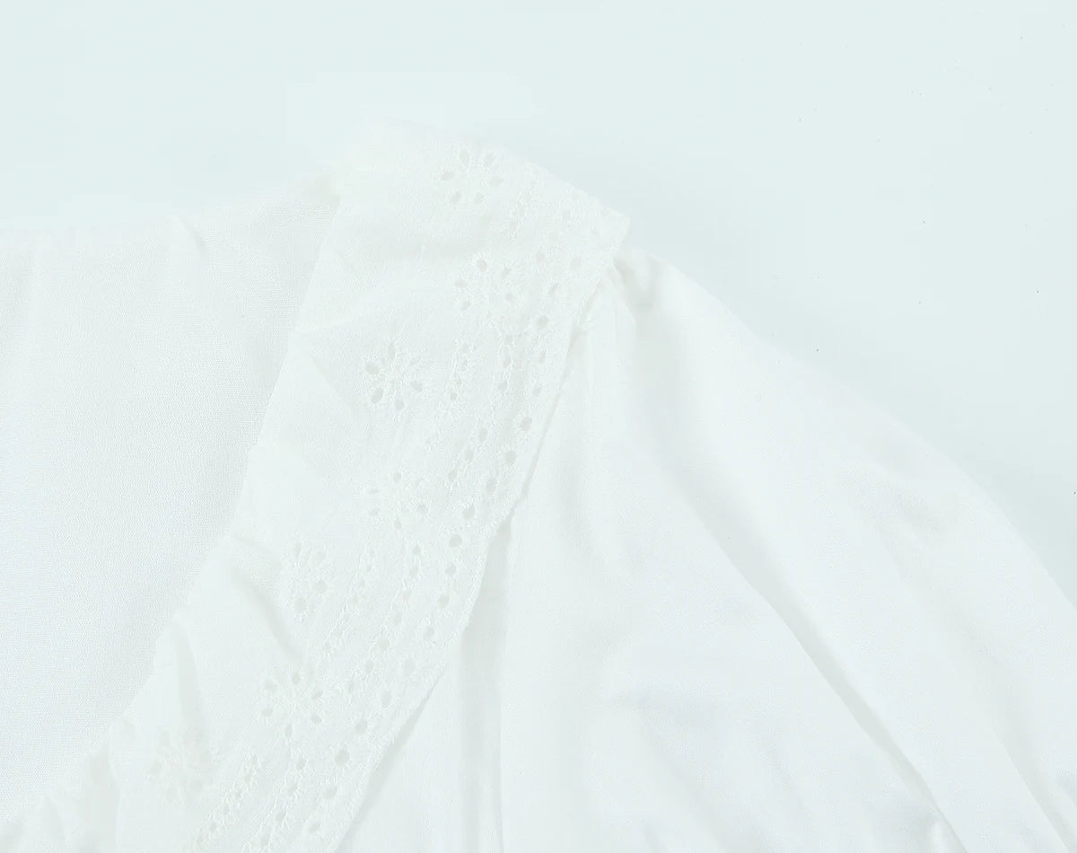 LIZAKOSHT  -  Sexy White Embroidery Hollow Out Hole Wood ears O neck Short Puff Sleeve Shirt Women Ruffles Hem Front Bow Lacing Up Crop Tops