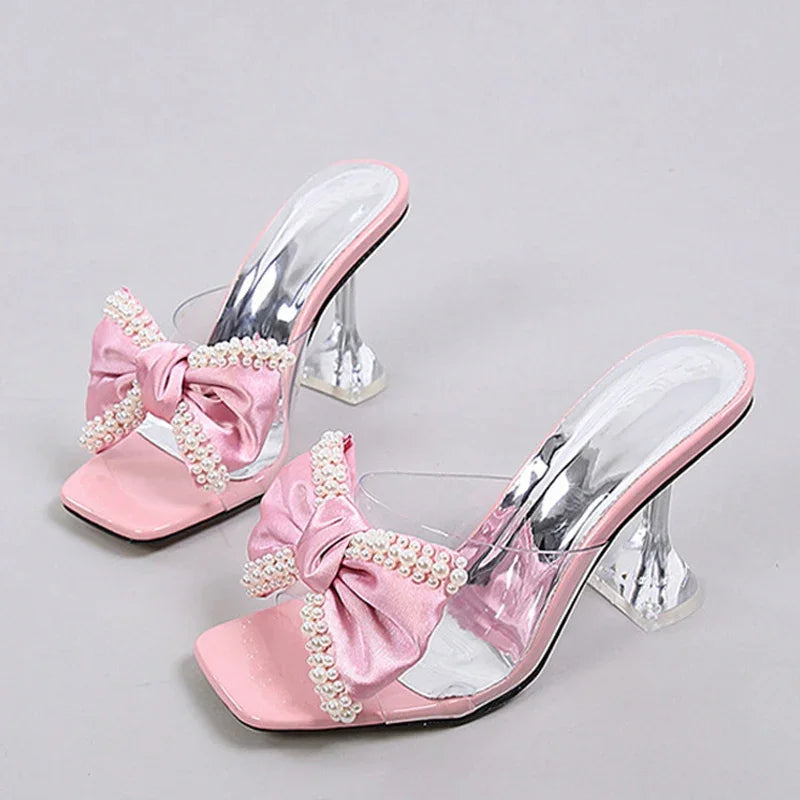 LIZAKOSHT  -  Fashion Pearl Bow Designer Women Slipper 2025 New Transparent PVC High Heeled Women Sandals Sexy Non Slip Mule Shoes Women Pumps