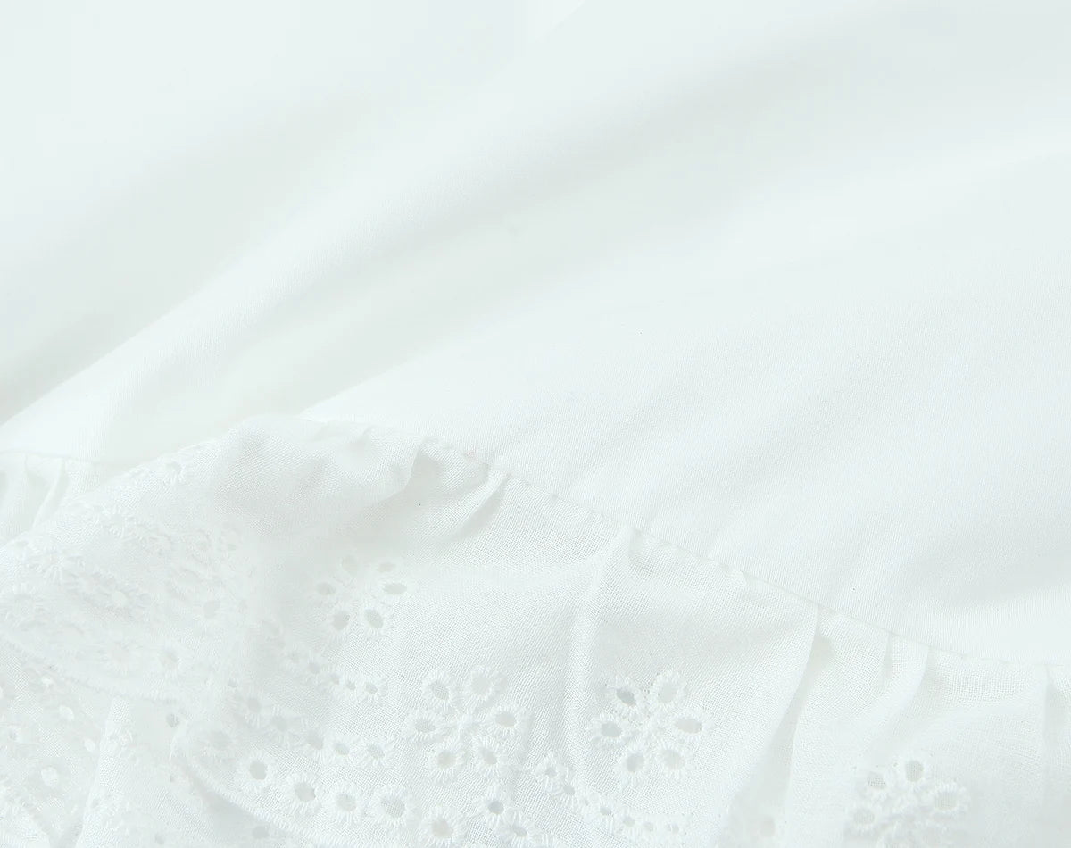 LIZAKOSHT  -  Sexy White Embroidery Hollow Out Hole Wood ears O neck Short Puff Sleeve Shirt Women Ruffles Hem Front Bow Lacing Up Crop Tops