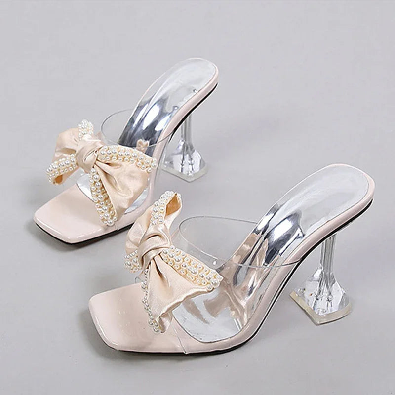 LIZAKOSHT  -  Fashion Pearl Bow Designer Women Slipper 2025 New Transparent PVC High Heeled Women Sandals Sexy Non Slip Mule Shoes Women Pumps