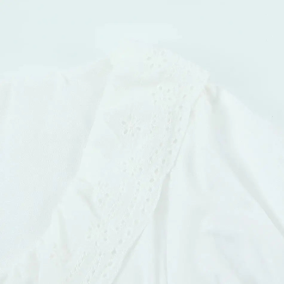 LIZAKOSHT  -  Sexy White Embroidery Hollow Out Hole Wood ears O neck Short Puff Sleeve Shirt Women Ruffles Hem Front Bow Lacing Up Crop Tops