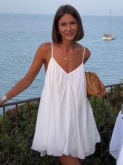 LIZAKOSHT  -  Sexy Backless White Mini Dress For Women Fashion V-neck Sleeveless Backless Sling A-line Dresses 2024 Lady Beach Vacation Robes