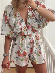 LIZAKOSHT  -  Women Deep V-Neck Loose Rompers Floral Print Short Puff Sleeve Summer Jumpsuits High Waist Playsuits Streetwear