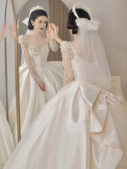 LIZAKOSHT  -  Satin Luxury Wedding Dresses Illusion O Neck Applique Sequined Beads Full Sleeve A Line Robe De Mariée Vestido Bow Bridal Gowns
