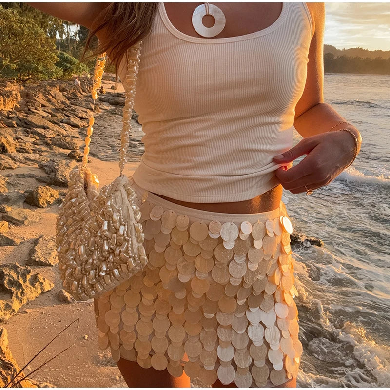 LIZAKOSHT  -  Sexy Beach Mini Skirts Women Slim Fashion Chic Shiny Short Skirt Female 2025 Spring Summer High Waist Solid Vacation Streetwear