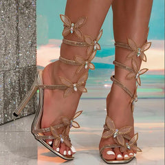 LIZAKOSHT  -  Serpentine Wrap Strap Open-toed Rhinestone Flash Diamond Bow Thin Heel High Heel Sexy Sandals Women's Shoes