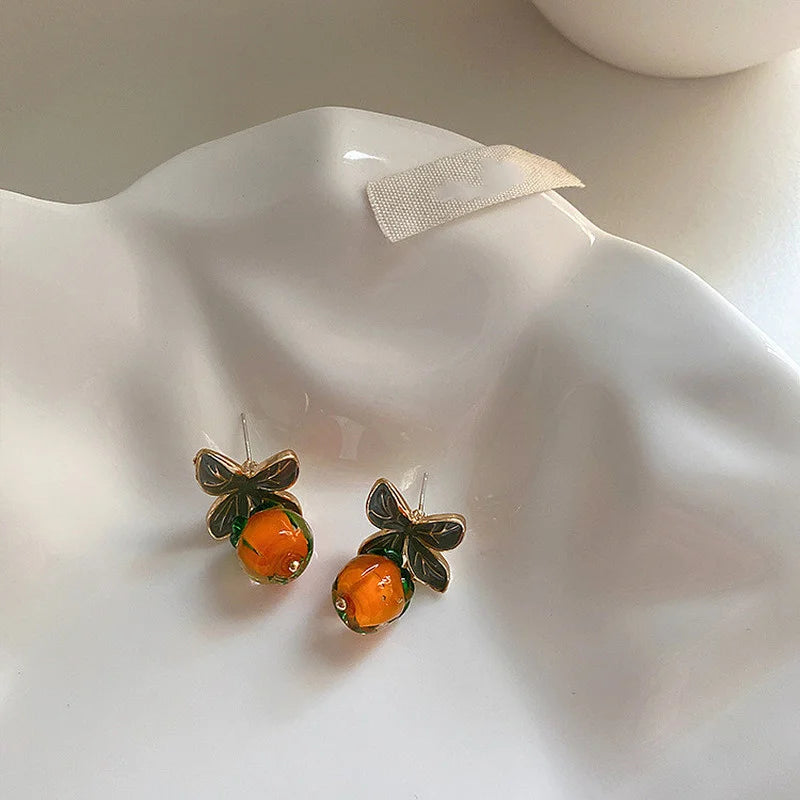 LIZAKOSHT Unique Design Enamel Resin Persimmon Drop Earrings for Women Creative Green Leaves Hanging Dangle Earrings Cute Jewelry