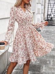 LIZAKOSHT  -  Ruffle Hem Floral Surplice Long Sleeve Dress