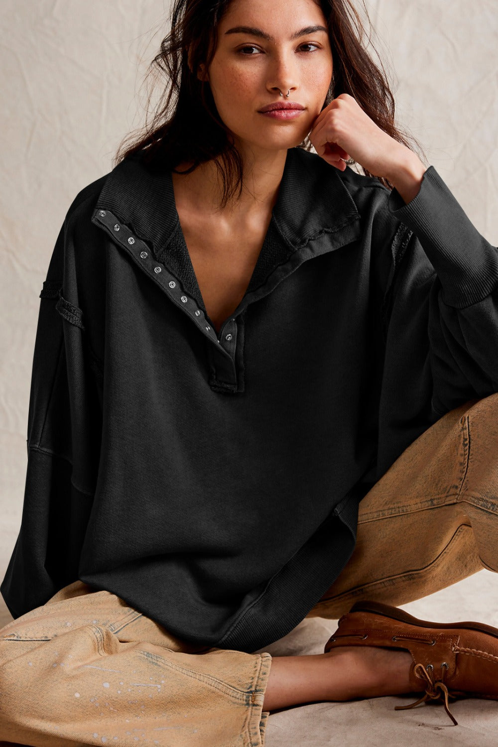 LIZAKOSHT  -  Exposed Seam Side Slit Long Sleeve Sweatshirt