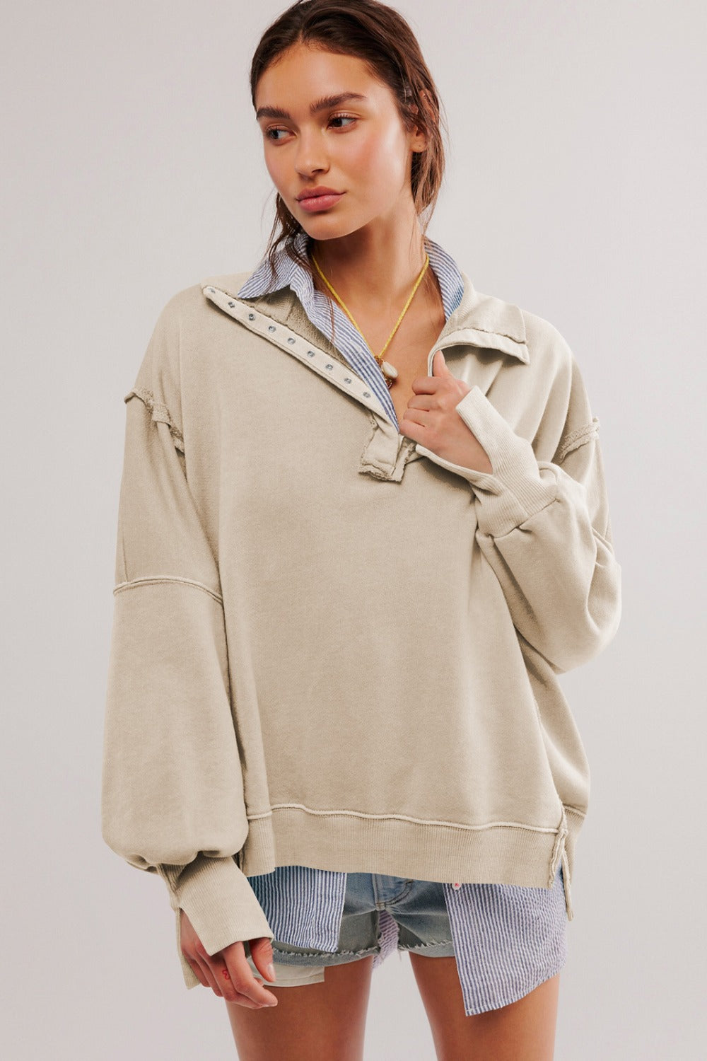 LIZAKOSHT  -  Exposed Seam Side Slit Long Sleeve Sweatshirt