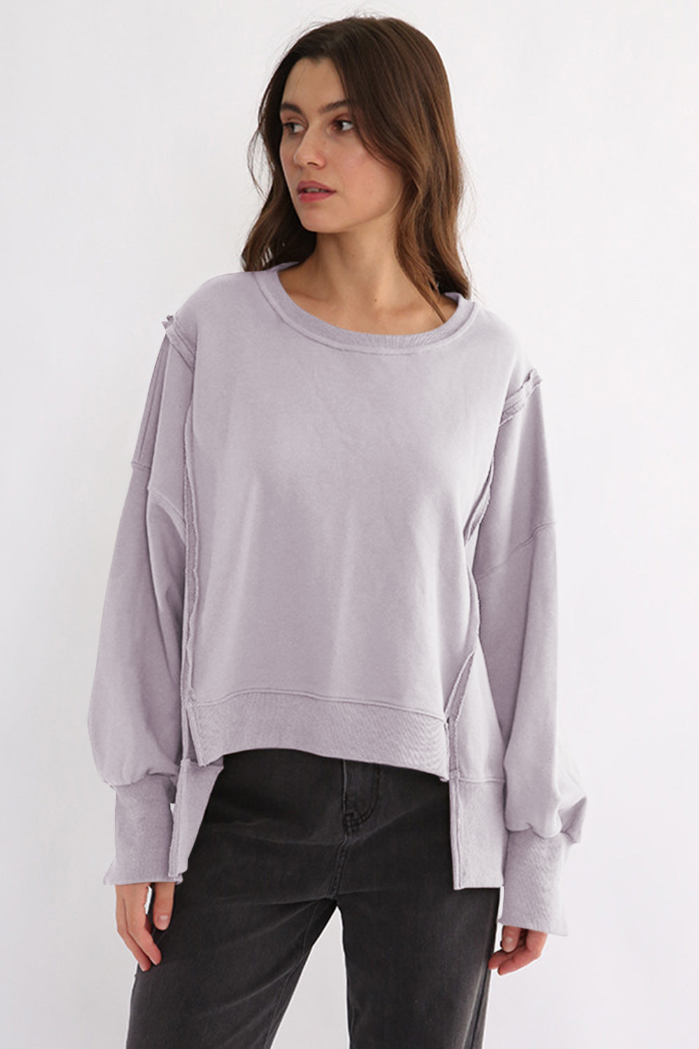 LIZAKOSHT  -  Exposed Seam High-Low Long Sleeve Sweatshirt