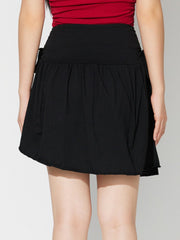 LIZAKOSHT  -  Side Tie Asymmetric Hem Mini Skirt